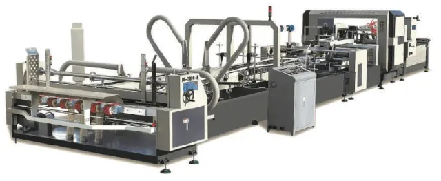 Máy dán thùng tự động tại nhà máy Minh Phúc